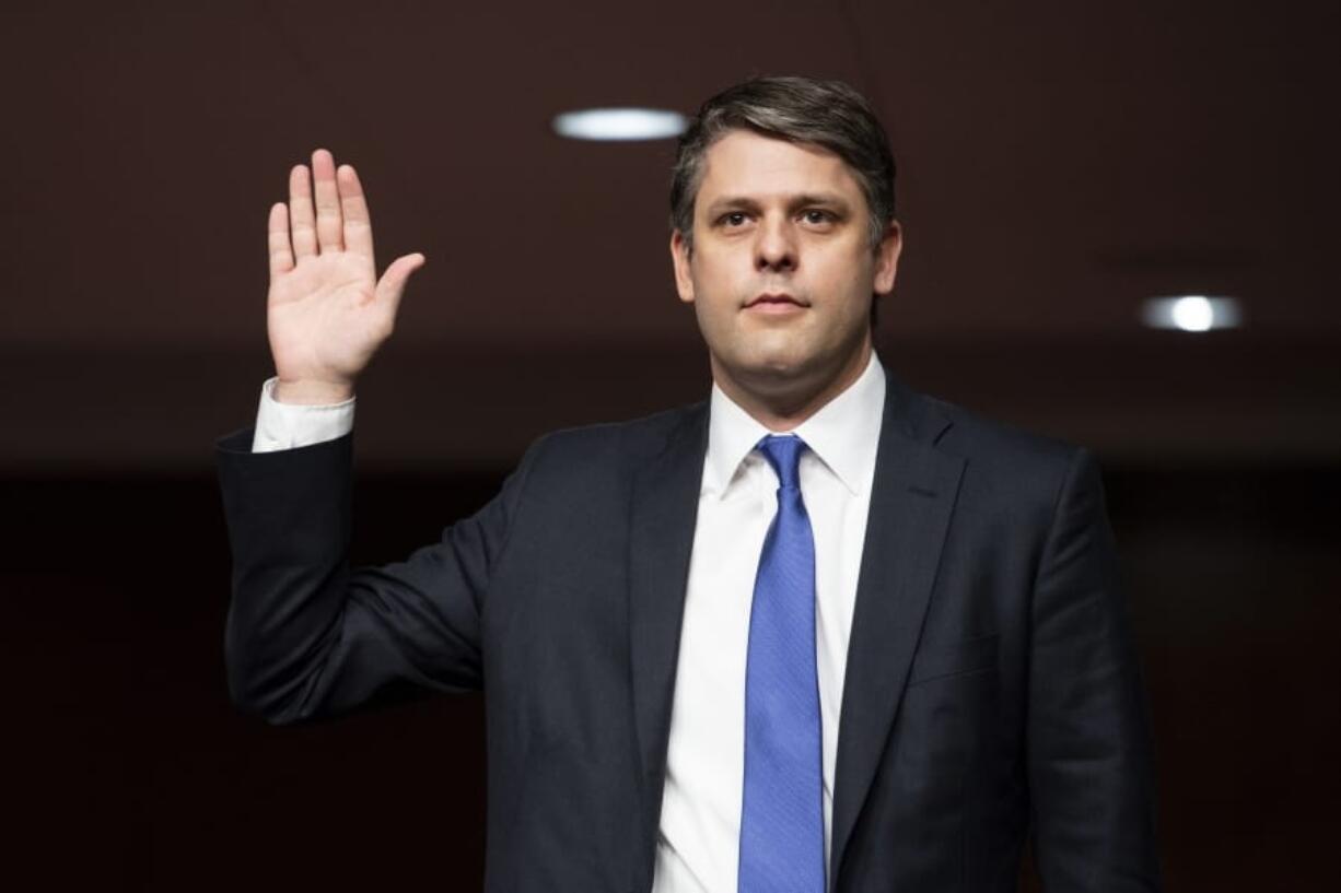 FILE - In this May 6, 2020 file photo, nominee Justin Walker to be U.S. District Judge for the District of Columbia Circuit testifies during a Senate Judiciary Committee hearing on Capitol Hill in Washington.