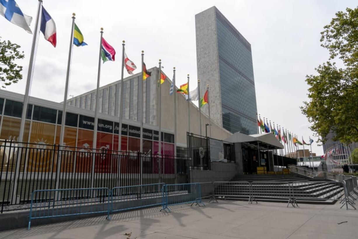 Metal barricades line the the shuttered main entrance to the United Nations headquarters, Friday, Sept. 18, 2020, in New York.  With the COVID-19 pandemic still circling the globe, world leaders are skipping their annual gathering in New York and will make pre-recorded speeches this week on the state of a deeply divided world turned topsy-turvy.