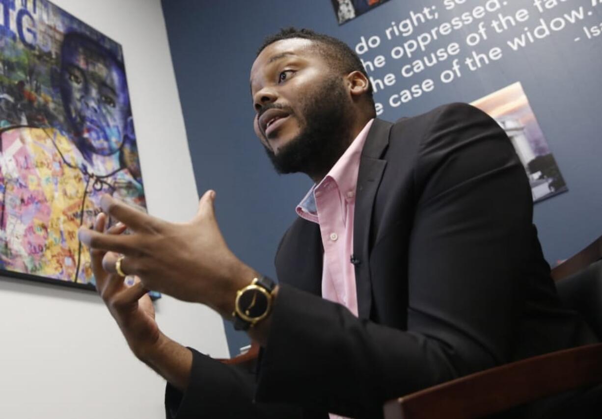 FILE -- In this Wednesday Aug. 14, 2019, file photo Stockton Mayor Michael Tubbs talks during an interview in Stockton, Calif. Mayors across the country are committing to give cash to low-income families with no restrictions on how they can spend it. It&#039;s part of a growing movement to establish a guaranteed minimum income as a way to combat poverty and systemic racism. Tubbs, launched one of the country&#039;s first guaranteed income programs last year with the help of private donations.