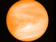 This May 2016 photo provided by researcher Jane Greaves shows the planet Venus, seen from the Japan Aerospace Exploration Agency&#039;s Akatsuki probe. A report released on Monday, Sept. 14, 2020 says astronomers have found a potential signal of life high in the atmosphere of our nearest neighboring planet. (J.