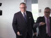 FILE - In this May 1, 2018, file photo, Former Donald Trump campaign official Michael Caputo, left, joined by his attorney Dennis C. Vacco, leaves after being interviewed by Senate Intelligence Committee staff investigating Russian meddling in the 2016 presidential election, on Capitol Hill in Washington. A House subcommittee examining President Donald Trump&#039;s response to the coronavirus pandemic is launching an investigation into reports that political appointees have meddled with routine government scientific data to better align with Trump&#039;s public statements. The Democrat-led subcommittee said Sept. 14, 2020 that it is requesting transcribed interviews with seven officials from the Centers for Disease Control and Prevention and the Department of Health and Human Services, including communications aide Michael Caputo. (AP Photo/J.