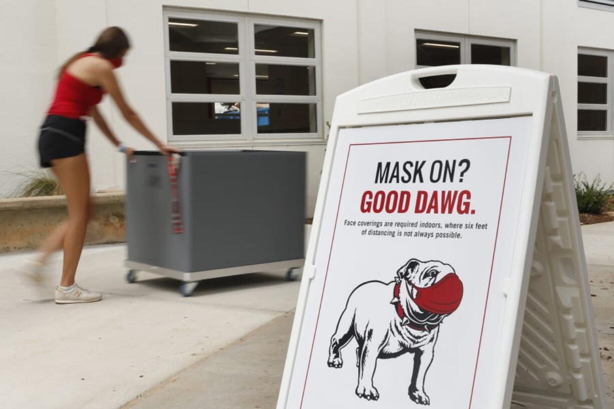 University of Georgia undergraduate students move into Brumby Hall one week before the start of the fall semester during the coronavirus pandemic on Friday, Aug. 14, 2020. (Joshua L.