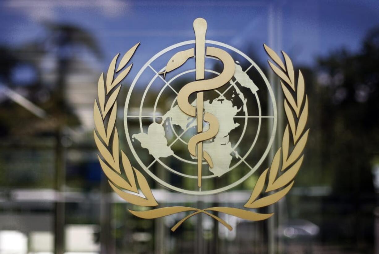 FILE - In this Thursday, June 11, 2009 file photo, the logo of the World Health Organization is seen at the WHO headquarters in Geneva, Switzerland. An independent panel appointed by the World Health Organization to review the U.N. health agency&#039;s coordination of the response to the COVID-19 pandemic said on Thursday, Sept. 3, 2020 it would have full access to any internal U.N. agency documents, materials and emails necessary as the group begins their probe.