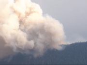 A view from a KPTV helicopter shows the Big Hollow Fire burning on a ridge in the Gifford Pinchot National Forest near Yale Reservoir.