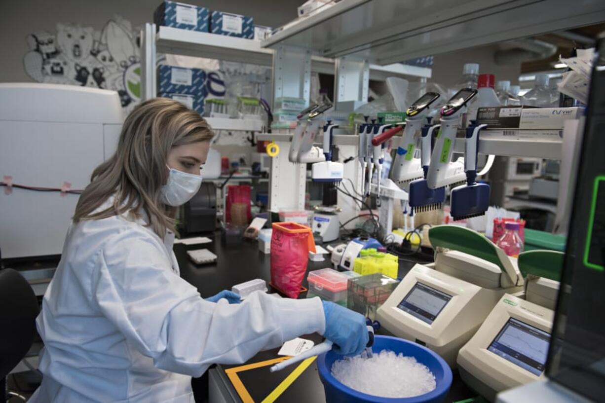 Research associate Hayley Carter works in the lab at Absci doing DNA sequencing sample preparation.