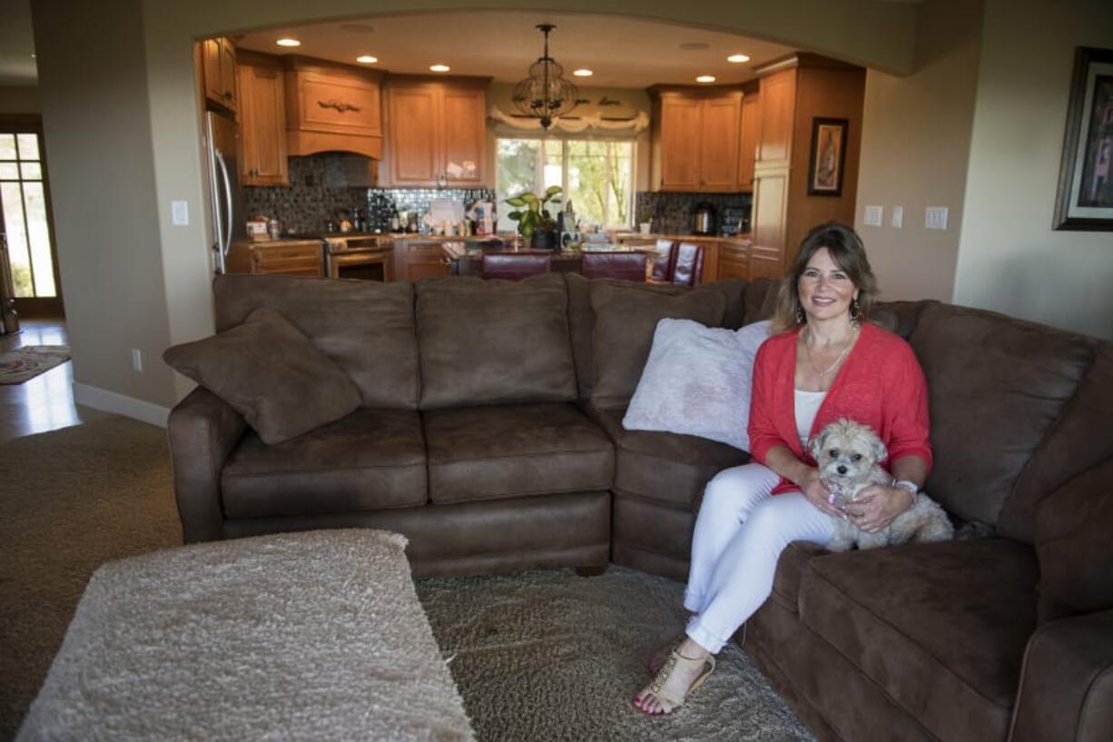 Leslie Girard recently celebrated one year since her breast cancer diagnosis. Every morning, she takes her dog, Bella, for a quick walk before heading out for a half hour on her own. She also strives to eat a plant-based diet in hopes of staving off cancer recurrence.