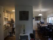 Sham Nawras, 6, prepares for a new school day with the help of her mom, Nour Alkafaween, while joined by her sister, Taj Nawras, 2, and her brother, Saif Nawras, 8, in their Vancouver apartment Monday morning.