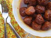 These meatballs are full of flavor, with a sweet sauce that gets kick from red pepper flakes.