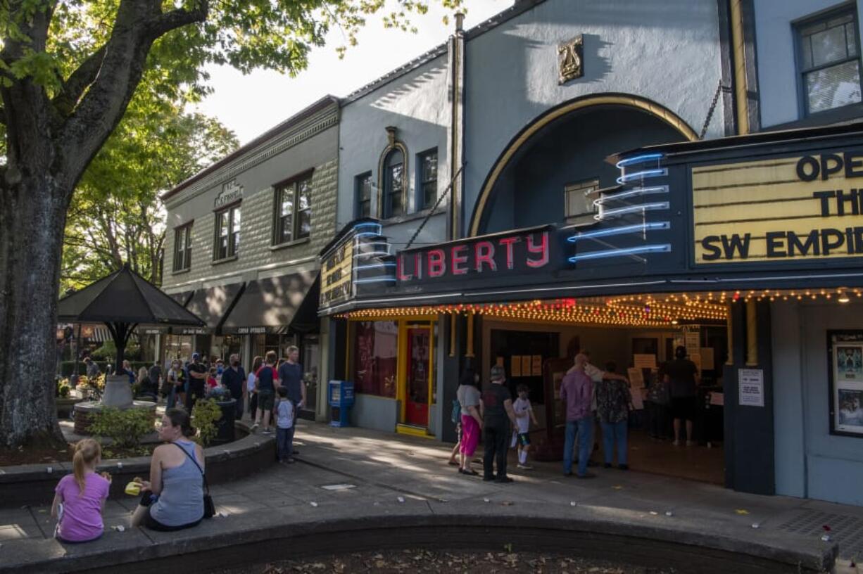 Moviegoers line up for Liberty Theatre&#039;s reopening screening of &quot;The Goonies&quot; on Friday afternoon. The theater had been closed for months due to the pandemic lockdown, but local lobbying convinced the governor&#039;s office to OK reopening with strict new safety protocols in place-- including operating at just 25 percent capacity for counties like Clark that are in the second phase of reopening.