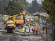 Contractors work a water main break at Columbia River High School in Vancouver on Oct. 16, 2020.