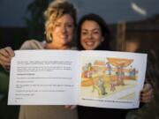 Illustrator Julie Dee, left, and author Solina Adelson-Journey are pictured with their book, &quot;When the City Went Quiet,&quot; in Vancouver. The friends collaborated on a children&#039;s book about the coronavirus pandemic.