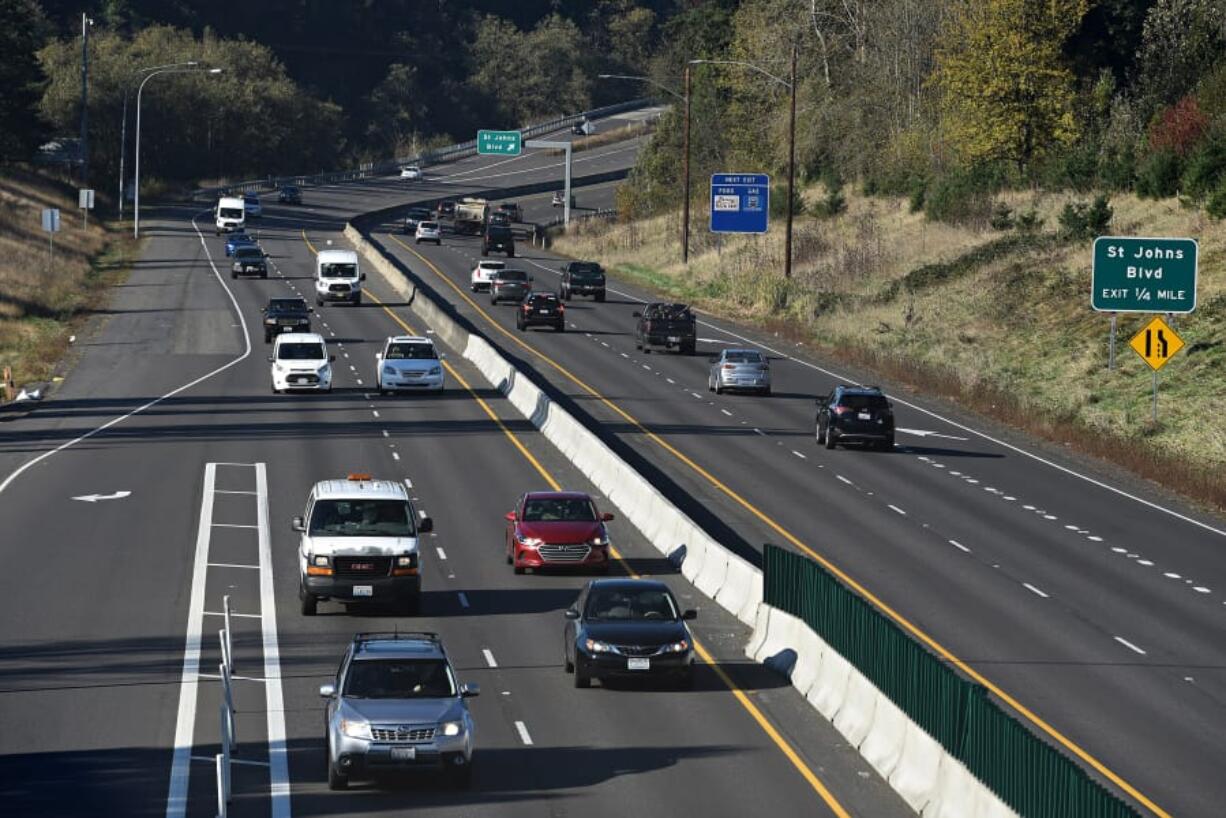 Motorists travel east on state Highway 500 near the intersection with Falk Road. WSDOT officials removed a traffic signal at the intersection two years ago, which has so far resulted in a 68 percent decrease in accidents.