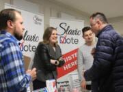 Dmitriy Sashchenko, left, Liliya Zhukova and Andrey Georgiyev last spring founded Slavic Vote, a group focused on registering Slavics to vote and educating them about the elections process.