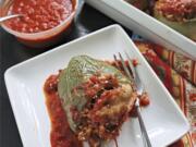 Bell peppers stuffed with a cheesy mixture of sweet Italian sausage, brown rice and Parmesan cheese make a hearty fall meal.