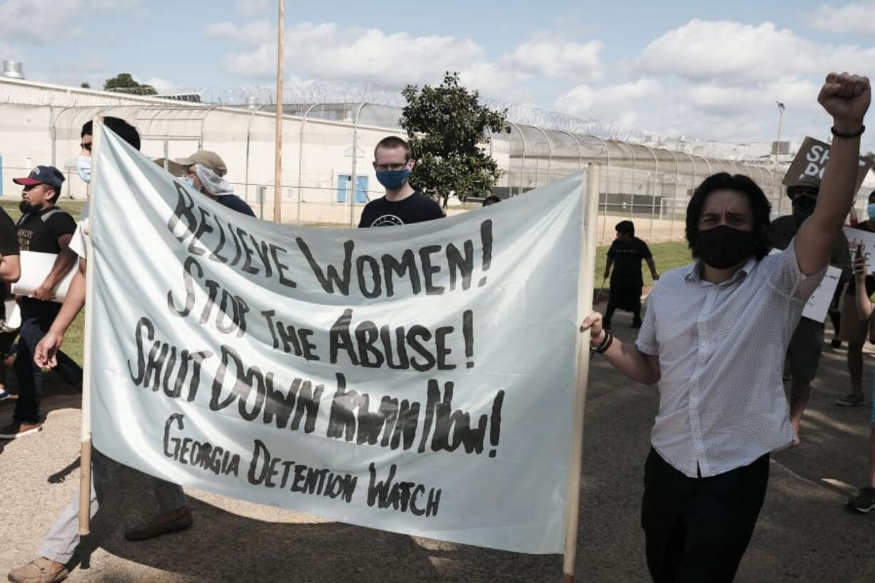 Demonstrators gather outside of Irwin County Detention Center. Four Georgia immigration support agencies filed a complaint against Irwin County Detention Center. Around 100 protesters met in Forsyth Park on Saturday, September 26, 2020 to protest the treatment of women at the ICE Irwin County Detention Center in Ocilla, Georgia.