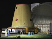 A Launch Vehicle Stage Adapter for the Artemis-1 mission is unloaded from a barge at Cape Canaveral Air Force Station in Florida on July 30.