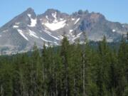 Ice age glaciers carved the features on Broken Top, a stratovolcano in the Central Oregon Cascades. Itis seen from the southeast on July 13, 2007, from the Cascade Lakes Highway just north of Mount Bachelor.