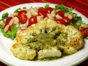 Cauliflower steak with bean and tomato salad.