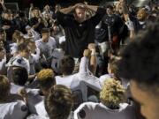 Union head coach Rory Rosenbach pauses before congratulating his team after Friday night&#039;s rivalry game at Doc Harris Stadium in Camas on Oct. 27, 2017. Union defeated Camas 14-13.