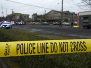 Crime scene tape surrounds the scene of a police shooting in downtown Vancouver on Feb. 28, 2019.