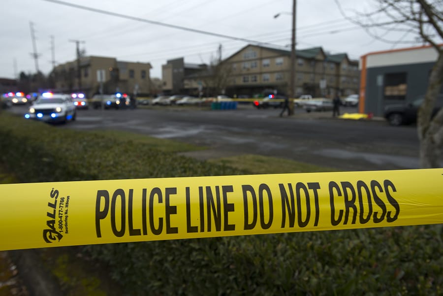 Crime scene tape surrounds the scene of a police shooting in downtown Vancouver on Feb. 28, 2019.