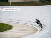 Vancouver native McKenna McKee, 17, rides the inner bank of the Alpenrose Velodrome in Portland. The steep banks can be terrifying at first, McKee says, but now that fear is what keeps her going.