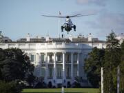 The helicopter that will carry President Donald Trump to Walter Reed National Military Medical Center in Bethesda, Md., lands on the South Lawn of White House in Washington, Friday, Oct. 2, 2020. The White House says Trump will spend a "few days" at the military hospital after contracting COVID-19. (AP Photo/J.