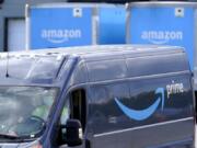 An Amazon Prime logo appears on the side of a delivery van as it departs an Amazon Warehouse location, Thursday, Oct. 1, 2020, in Dedham, Mass. Halloween is still weeks away, but retailers are hoping you&#039;Aoll start your holiday shopping now. The big push is coming from Amazon, which is holding its annual Prime Day sales event Tuesday, Oct. 13 and Wednesday, Oct. 14.