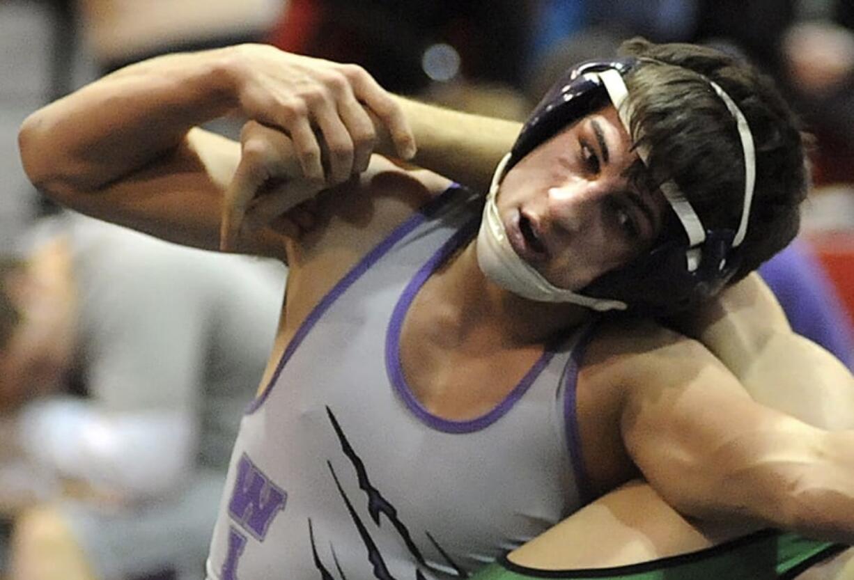 FILE-This Jan. 16, 2014 file photo shows Keystone High School Logan Stiner during a wrestling match in Sheffield Village, Ohio. The coroner said Stiner, who died May 27, 2014, had more than 70 micrograms of caffeine per milliliter of blood in his system.  The Ohio Supreme Court plans Wednesday, April 29, 2020 to hear arguments for and against a lawsuit brought by Stiner&#039;s family arguing that Amazon, the online retail giant, as the company that shipped the product, should be held responsible under Ohio product liability law.