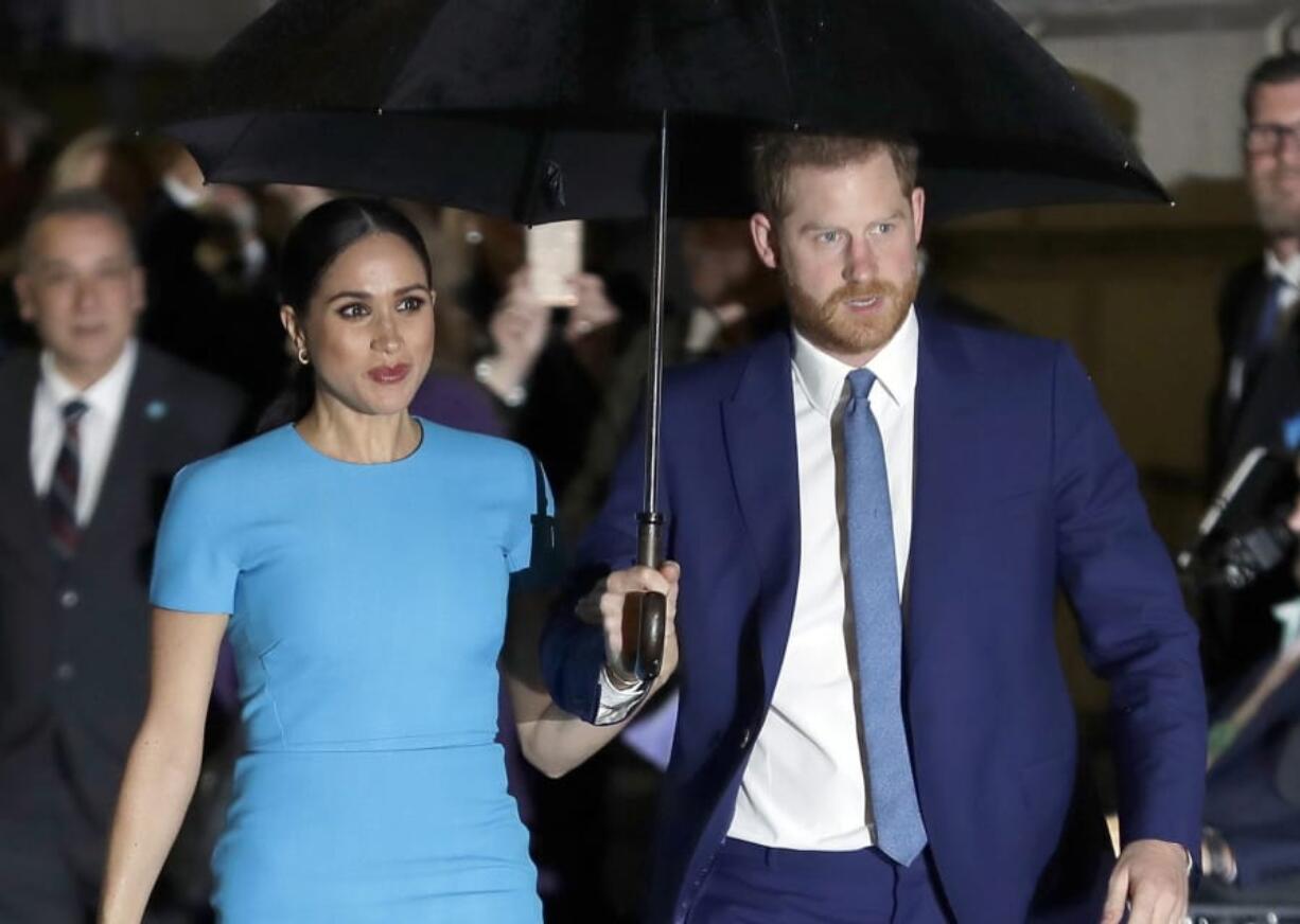 Britain's Prince Harry and Meghan, the Duke and Duchess of Sussex arrive at the annual Endeavour Fund Awards in London. Britain’s Prince Harry says it took him many years and the experience of living with his wife, the former Meghan Markle, to understand how his privileged upbringing shielded him from the reality of unconscious bias.