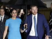 Britain's Prince Harry and Meghan, the Duke and Duchess of Sussex arrive at the annual Endeavour Fund Awards in London. Britain’s Prince Harry says it took him many years and the experience of living with his wife, the former Meghan Markle, to understand how his privileged upbringing shielded him from the reality of unconscious bias.