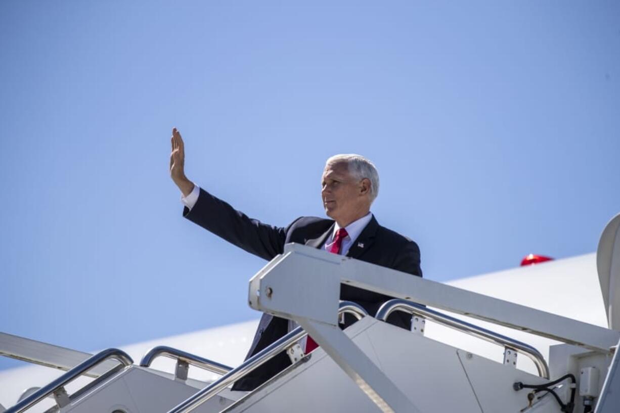 Vice President Mike Pence arrives at Dobbins Air Reserve Base in Marietta, Ga., Wednesday, Sept. 30, 2020.