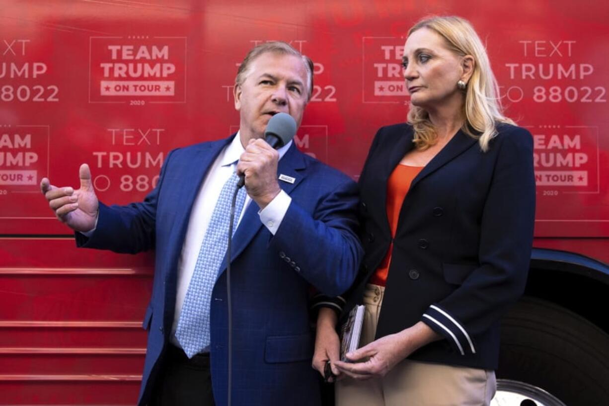 St. Louis-based lawyers Mark and Patricia McCloskey speak outside the Republican campaign office in downtown Scranton, Pa., during an appearance with former congressman Lou Barletta for a Trump campaign event on Wednesday, Sept. 30, 2020. The McCloskeys received national attention in June when they pulled guns on Black Lives Matter protesters who broke into their gated community and marched past their home.