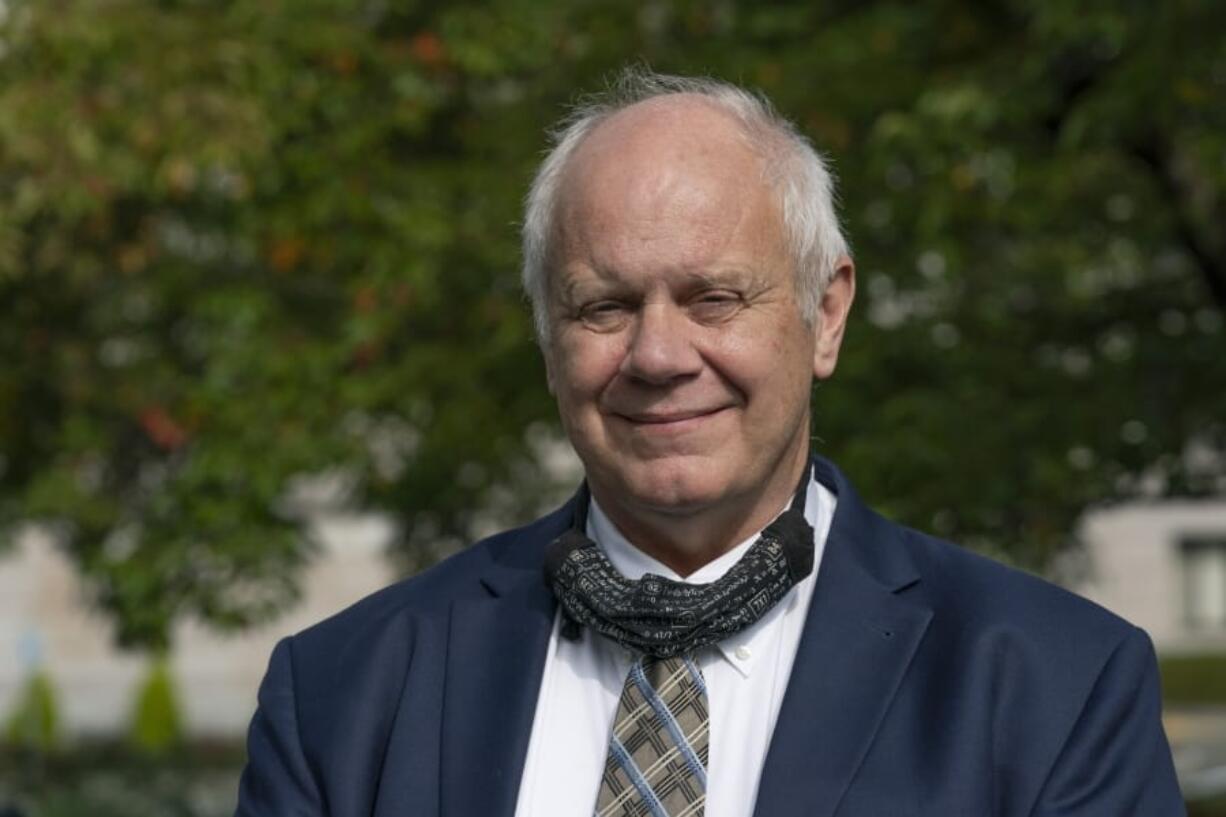 State Treasurer Duane Davidson poses for a photo Friday, Oct. 2, 2020, in Olympia, Wash. Davidson, a Republican, is facing Democrat Mike Pellicciotti in the upcoming election for treasurer. (AP Photo/Ted S. Warren) (Photos by Ted S.