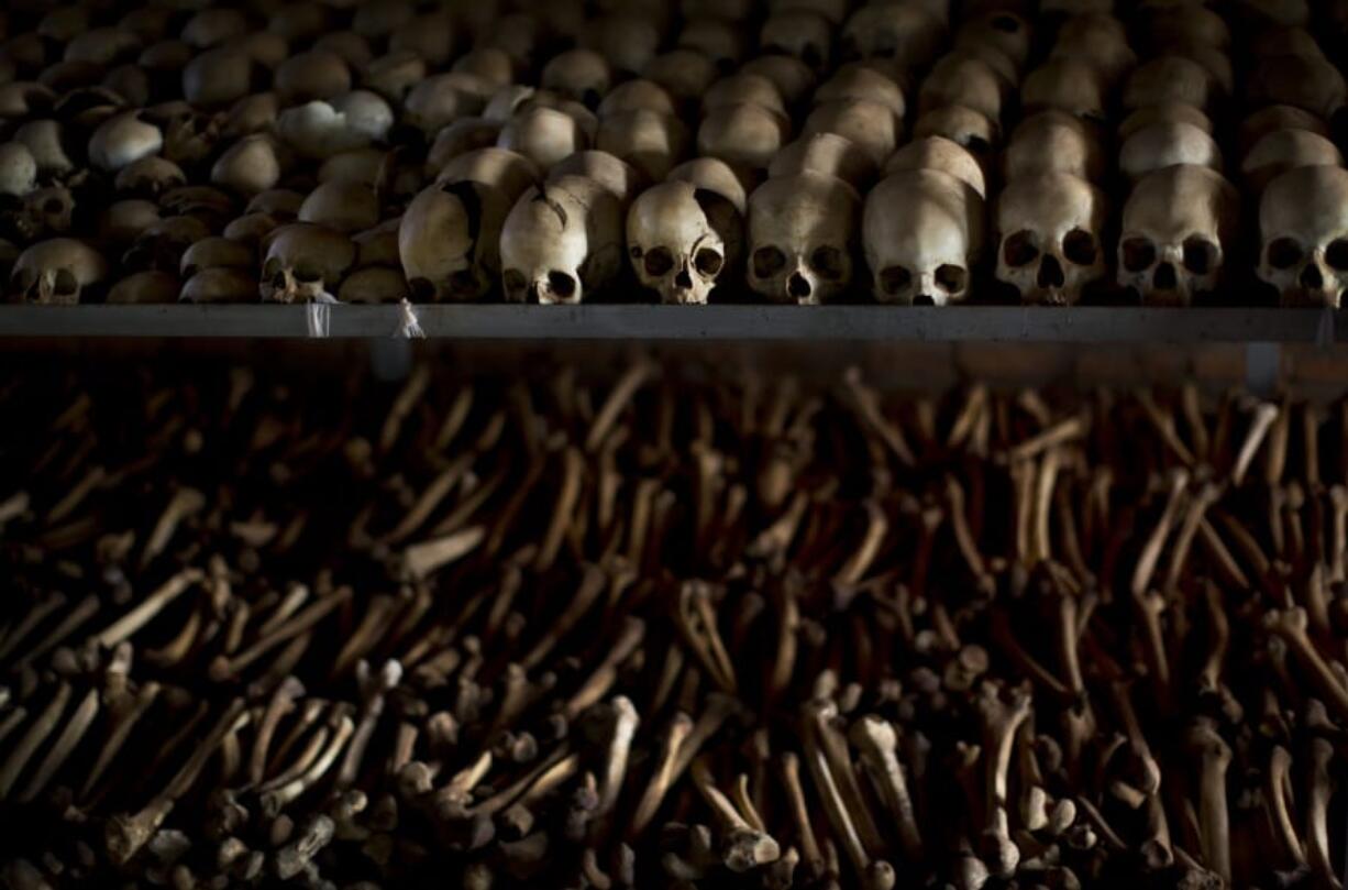 FILE - In this Friday, April 4, 2014 file photo, the skulls and bones of some of those who were slaughtered as they sought refuge inside the church are laid out as a memorial to the thousands who were killed in and around the Catholic church during the 1994 genocide in Ntarama, Rwanda. France&#039;s highest court on Wednesday Sept.30, 2020 rejected Rwandan genocide suspect Felicien Kabuga&#039;s appeal of a decision to extradite him to an international court in The Hague. Kabuga, one of the most-wanted fugitives in Rwanda&#039;s 1994 genocide, was arrested outside Paris in May after 25 years on the run.