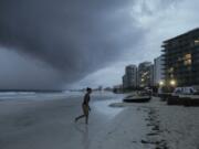 Clouds gather over Playa Gaviota Azul as Tropical Storm Zeta approaches Cancun, Mexico, Monday, Oct. 26, 2020. A strengthening Tropical Storm Zeta is expected to become a hurricane Monday as it heads toward the eastern end of Mexico&#039;s resort-dotted Yucatan Peninsula and then likely move on for a possible landfall on the central U.S. Gulf Coast at midweek.