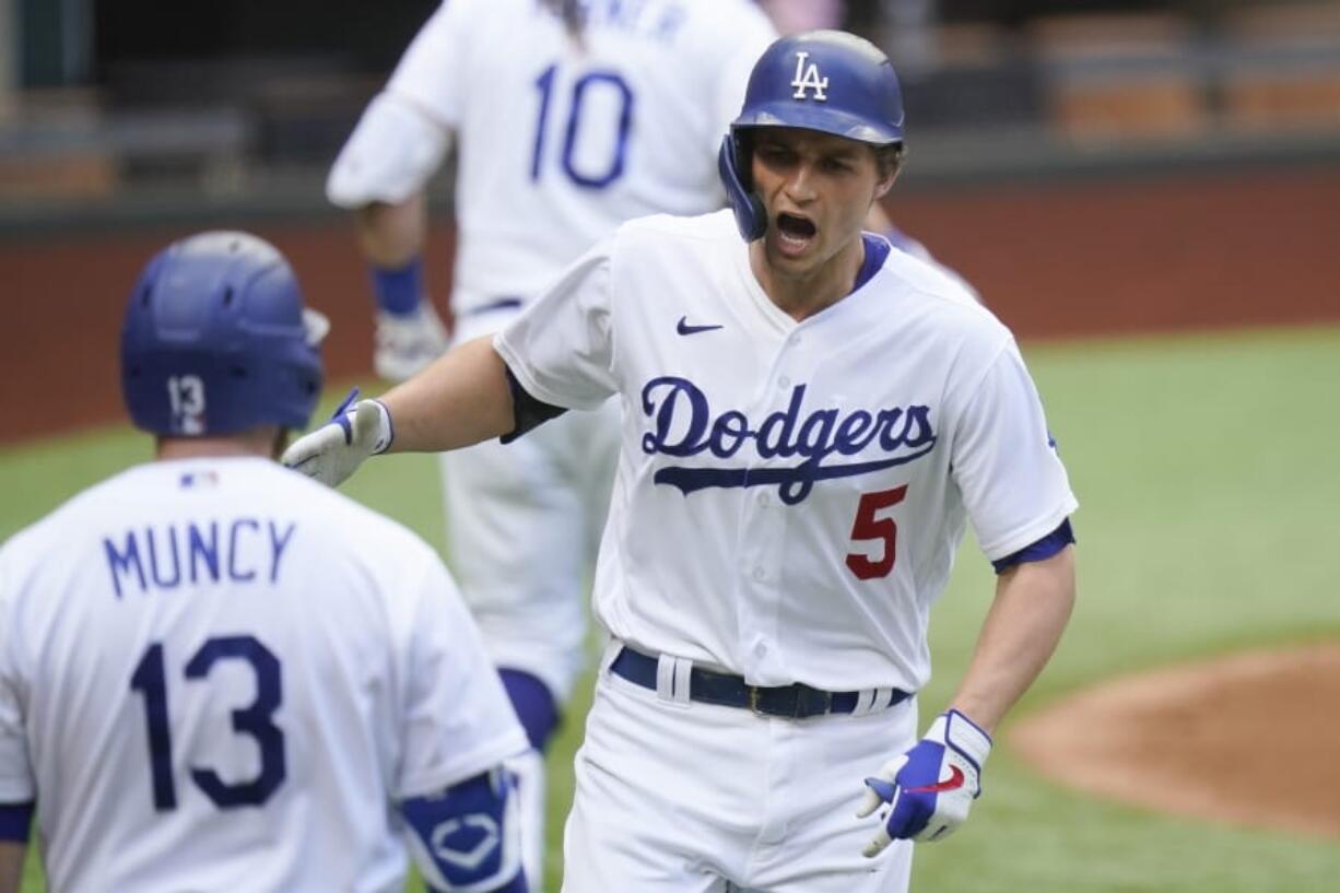 Los Angeles Dodgers&#039; Corey Seager celebrates his home run against the Atlanta Braves during the first inning in Game 6 of a baseball National League Championship Series Saturday, Oct. 17, 2020, in Arlington, Texas.