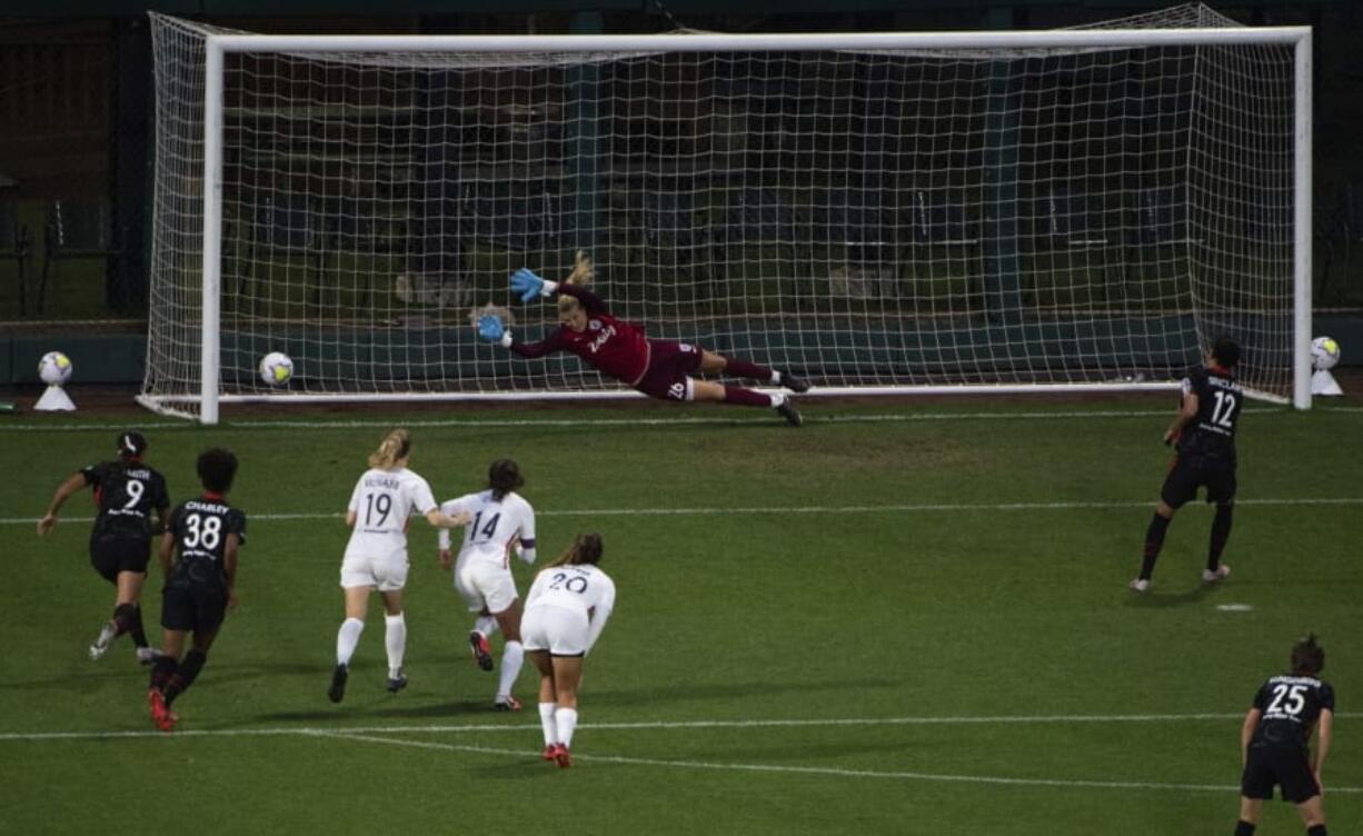 Portland Thorns&#039; Christine Sinclair (12) scores on a penalty kick in the second half of an NWSL soccer match at Cheney Stadium in Tacoma, Wash., on Saturday, Oct. 10, 2020.