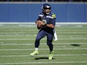 Seattle Seahawks quarterback Russell Wilson leads the NFL with 14 touchdown passes. The Seahawks play at the Miami Dolphins on Sunday, Oct. 4, 2020.