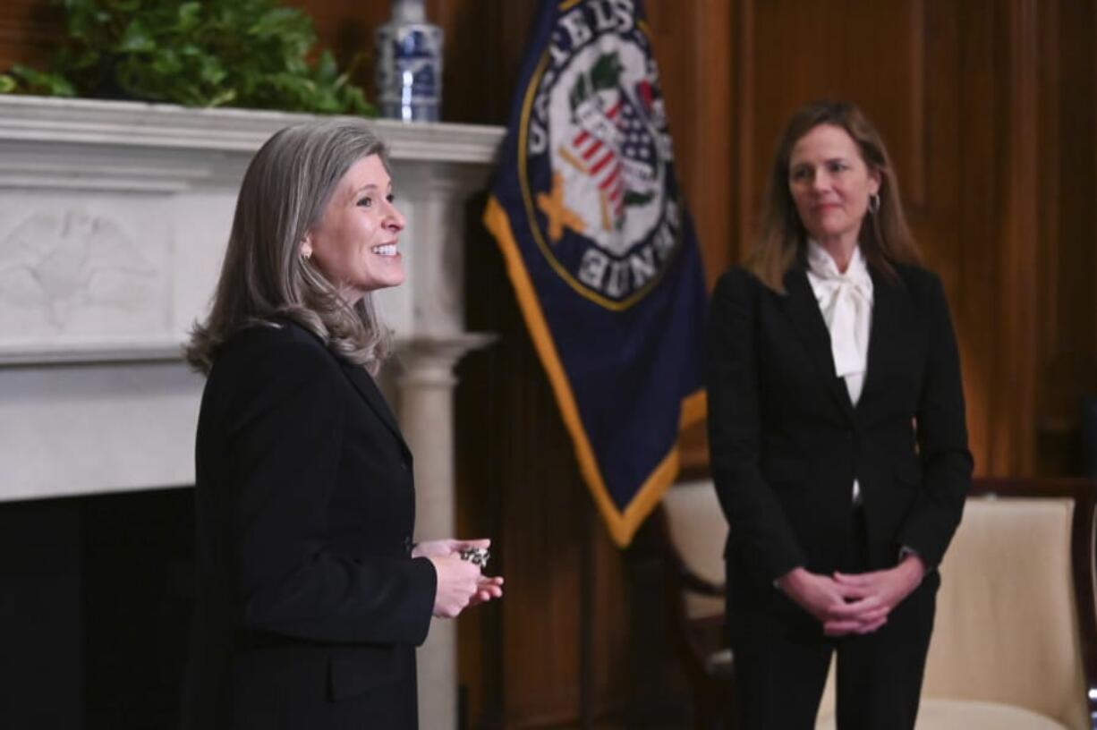 Supreme Court nominee Judge Amy Coney Barrett, meets with Sen. Joni Ernst, R-Iowa, Thursday, Oct. 1, 2020 at the Capitol in Washington.