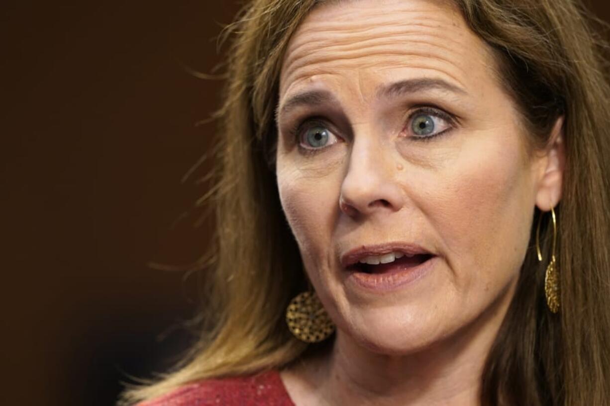 In this Oct. 13, 2020, photo, Supreme Court nominee Amy Coney Barrett answers questions from Sen. Mazie Hirono, D-Hawaii, during the second day of her confirmation hearing before the Senate Judiciary Committee on Capitol Hill in Washington.