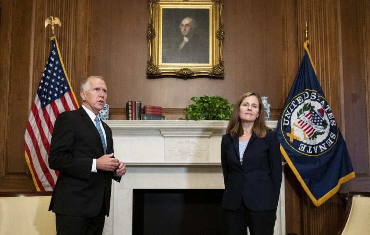 Sen. Thom Tillis, R-N.C., meets with Judge Amy Coney Barrett, President Donald Trump&#039;s nominee to the Supreme Court at the U.S. Capitol Wednesday, Sept. 30, 2020, in Washington.