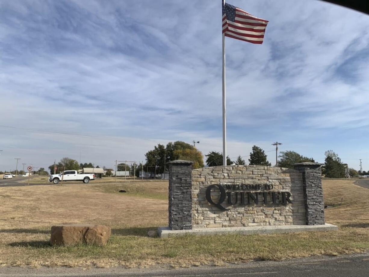 This undated photo provided by Mike Haase shows a sign welcoming people to the town of Quinter, Kansas. Quinter is the largest city in Gove County. Rural northwestern Kansas communities last week of Oct. 9, 2020, were seeing some of the state&#039;s biggest spikes in COVID-19 cases, Gove County Sheriff Allan Weber caught the virus, found himself coughing and struggling to breathe, sometimes dozens of times a day, and landed in an acute-care hospital room more than an hour from home. The pandemic arrived late, but it&#039;s now stressing the county, which has had to send patients like Weber to hospitals in other towns.