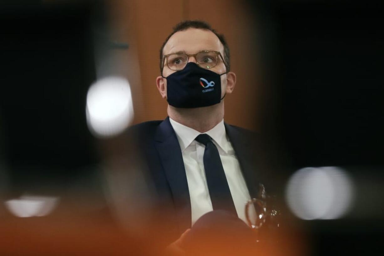 FILE - In this file photo dated Wednesday, Oct. 21, 2020, German Health Minister Jens Spahn attends the weekly government cabinet meeting at the chancellery in Berlin.  Spahn said Friday Oct. 30, 2020, that World Health Organisation (WHO) should receive more political support and financial backing for its international efforts to manage acute health crises, and given greater powers to independently investigate virus outbreaks.