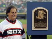 Former Chicago White Sox manager Tony La Russa stands with his Baseball Hall of Fame plaque in 2014 in Chicago. La Russa, the Hall of Famer who won a World Series championship with the Oakland Athletics and two more with the St. Louis Cardinals, is returning to manage the Chicago White Sox 34 years after they fired him, the team announced Thursday, Oct. 29, 2020.