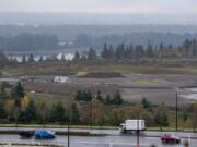 Motorists drive along Southeast 192nd Avenue through the old Fisher Quarry, where Hurley Development has plans to redevelop the west half. The east half is already under redevelopment.