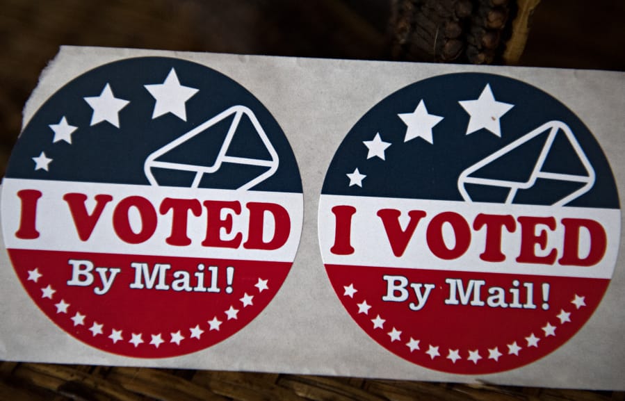 Vote By Mail stickers are pictured in Vancouver.