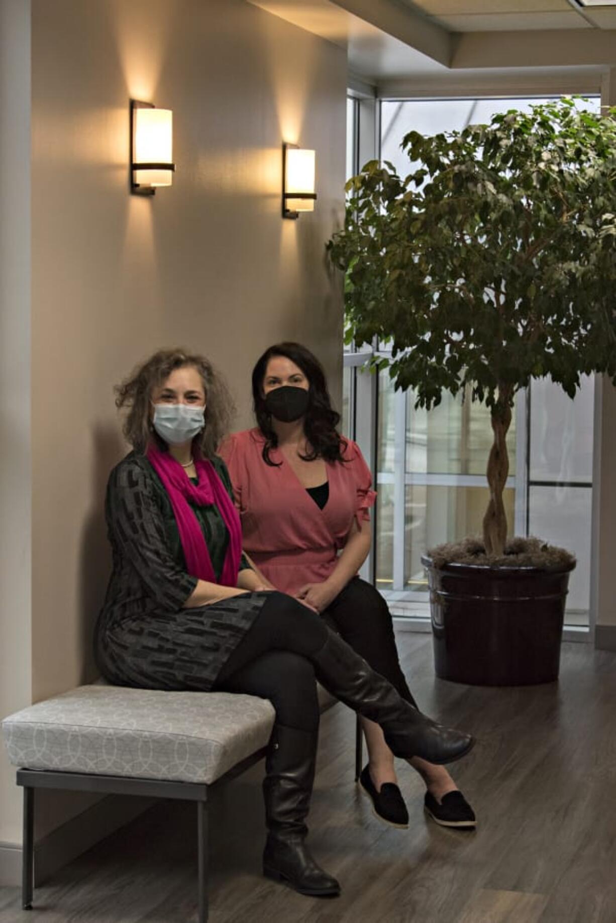 Susan Stearns, left, CEO of the Pink Lemonade Project, pauses for a portrait with Melissa Mohr, practice manager at Dr. Allen Gabriel&#039;s office in Vancouver. Stearns and Mohr have worked together on Holiday Glow, which will provide financial assistance to breast cancer patients and those in recovery this holiday season.