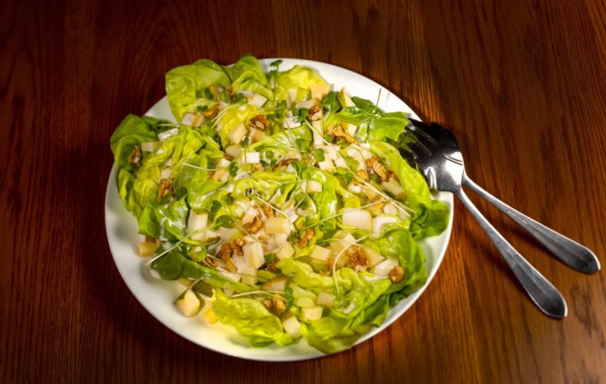 Large chunks of sweet pear and musky Gruyere are toppled over butter lettuce and dressed with a creamy, tangy buttermilk dressing. (Jay L.