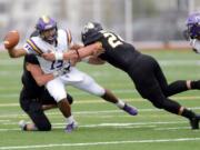 After a move to the defensive line as a junior, Woodland High grad Tristan Thomas (24) has flourished at Pacific Luthern. He appeared in all nine games last season, tallied 52 tackles, 5.5 sacks and was named an all-Northwest Conference honorable mention.